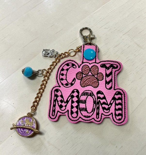 6402539f156d102fec901311_cat-mom-pink_1775990712774.jpg