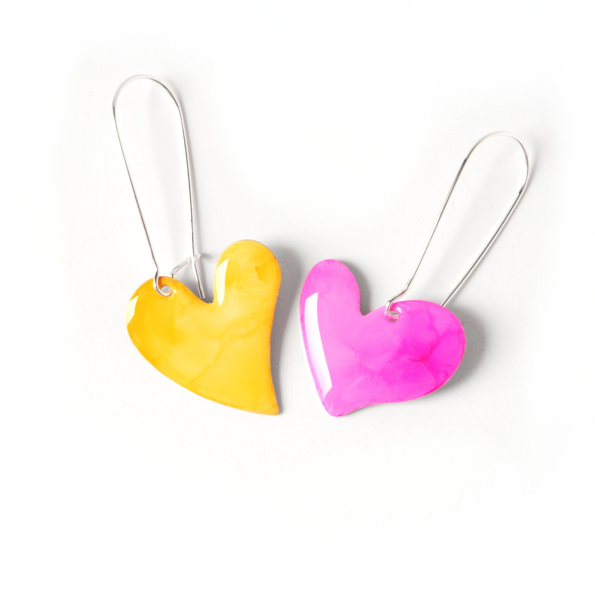 6402539f156d102fec901311_cotton-candy-bleeding-heart-earrings_1779555693383.jpg