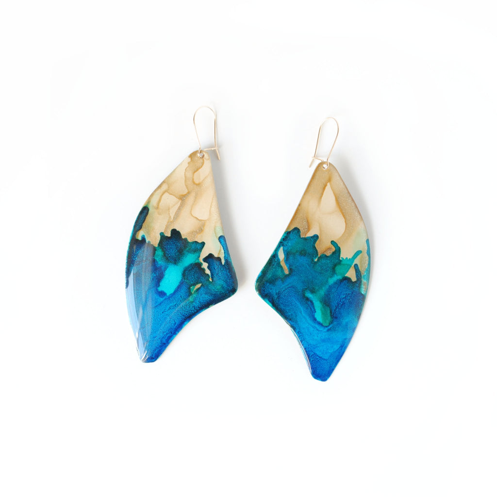 6402539f156d102fec901311_flowing-carefree-baoab-earrings-front_1779555308362.jpg