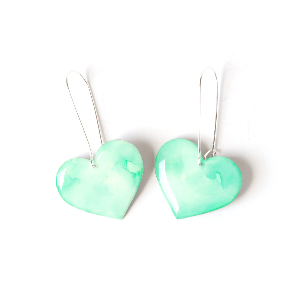6402539f156d102fec901311_minted-love-rosy-heart-dangle-earrings-front_1779557641594.jpg