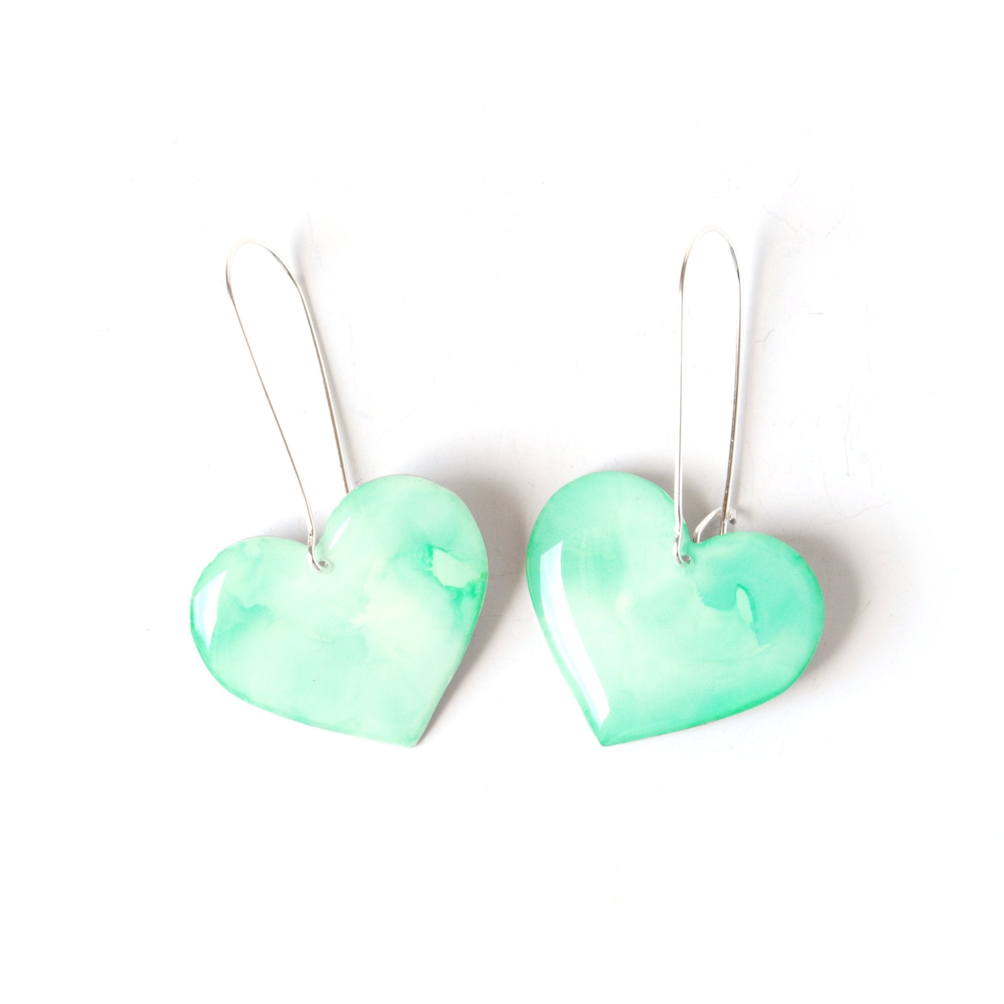 6402539f156d102fec901311_minted-love-rosy-heart-dangle-earrings-front_1779557641594.jpg