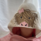 6402539f156d102fec901311_peeker-highland-cow-towel_1779979250838.jpg