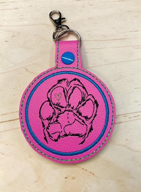 6402539f156d102fec901311_pink-dog-paw-with-heart_1775992411720.jpg
