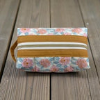 6402539f156d102fec901311_rose-pink-and-gold-pouch_1775438088999.jpg
