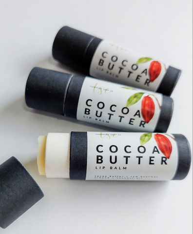 6402539f156d102fec901311_thompson-soap-co-cocoa-butter-lip-balm_1758921355318.png