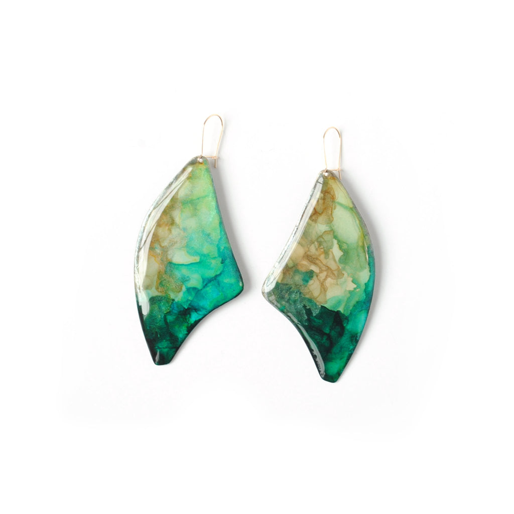 6402539f156d102fec901311_tidal-glow-baobab-earrings-front_1779555295793.jpg